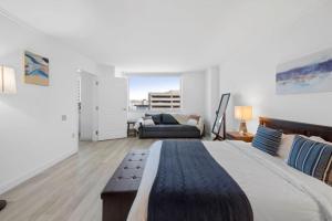 Spacious Boardwalk 2BR 3BA Condo by CozySuites