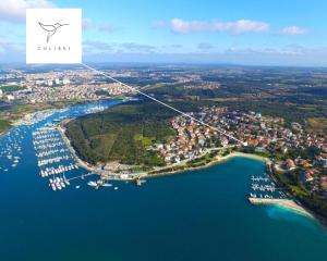 COLIBRI-Design&Beach Appartement mit 40m2 Terrasse und 2 SUPs