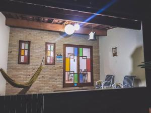 Casa Rústica em Condomínio com piscina e muita natureza