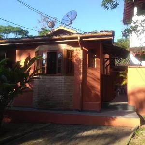 Casa Rústica em Condomínio com piscina e muita natureza