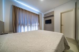 166 - Lindo apartamento na praia de Canto Grande