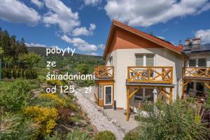 DOMINO - pokoje i apartamenty