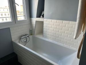 Appartement sur les toits de Paris vue Tour Eiffel 4 chambres