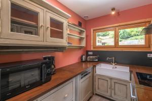 Chalets du Bouchot & Jacuzzi privatif proximite Gerardmer & La Bresse : photos des chambres