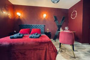 Appartements Love Room Le Baroque / Jacuzzi / Sauna : photos des chambres
