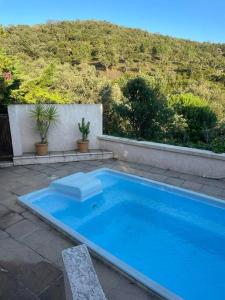 Maisons de vacances La petite maison sur la colline - Piscine privee : photos des chambres
