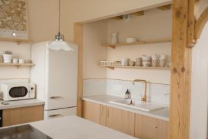 Maisons de vacances Le Lodge de l'ocean - Maison familiale en bois neuve - Piscine chauffee : photos des chambres