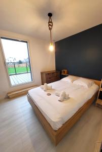 Maisons de vacances TY COAT - Maison neuve avec vue mer, piscine et bain nordique : photos des chambres