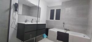 Appartements Spacieux et serein avec patio, barbecue et WIFI : photos des chambres