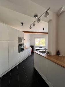 Appartements Le duplex du journaliste : photos des chambres