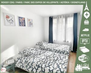 Appartements Appartement proche Roissy CDG, Parc expos de Villepinte, Disneyland, Paris, Asterix : photos des chambres