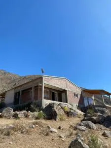 Casa en la montaña con gran vista al valle y lago - Alumbrera