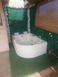 Cabaña con JacuzziZona BBQ y Malla catamarán en Guarne