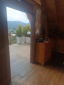 Cabaña con JacuzziZona BBQ y Malla catamarán en Guarne