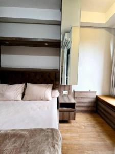 Apt Transpark Bintaro Studio with Pool by Damaresa