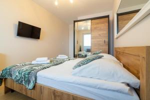 Apartament z dwoma sypialniami i z miejscem postojowym