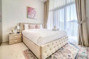 Exquisite 4BR Townhouse at DAMAC Hills 2, Dubailand by Deluxe Holiday Homes