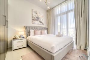 Exquisite 4BR Townhouse at DAMAC Hills 2, Dubailand by Deluxe Holiday Homes