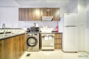Exquisite 4BR Townhouse at DAMAC Hills 2, Dubailand by Deluxe Holiday Homes