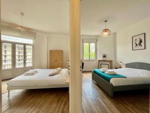 Appartements Suite Montoison Reims : photos des chambres
