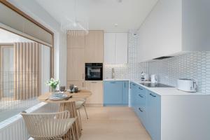 Pastel Blue Studio Grunwald with Garden & Parking Poznań by Renters