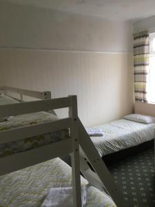 Family Room (2 Adults + 2 Children) room in Royal Hotel