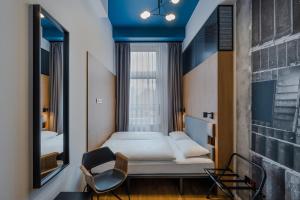 Double Room with Extra Bed room in Dean's College Hotel