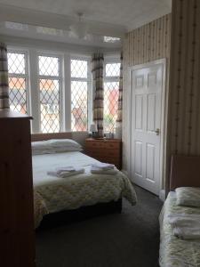 Family Room (2 Adults + 1 Child) room in Royal Hotel