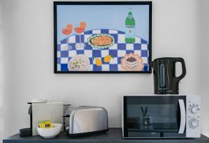Les Stins - Appartements climatises - centre ville : photos des chambres