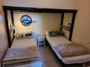 Appartements La goelette - Les Gites de la Cote d'Amour : photos des chambres