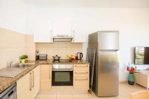 Austin - Coralli Beachfront Apartment