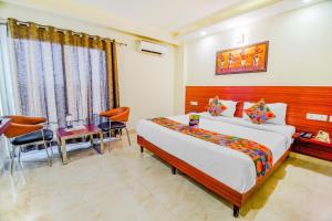 FabHotel VR Stay Near Millennium City Centre Gurugram