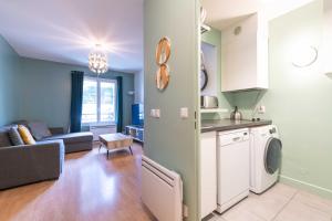Appartements F2 colore et confortable proche Disney+WIFI : photos des chambres