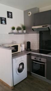 Appartements Canet Appart cosy et climatise avec piscine Vue jardin : photos des chambres