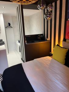 Appartements Appartement avec Jacuzzi pour 2 personnes : photos des chambres