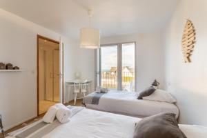 Maisons de vacances Ty Far - Villa pour 8 vue sur le Port : photos des chambres