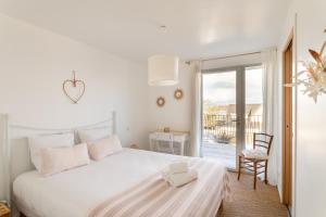 Maisons de vacances Ty Far - Villa pour 8 vue sur le Port : photos des chambres