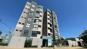 Novo e amplo apartamento a poucos passos do Shopping JL - 圣特雷济尼亚-迪伊泰普