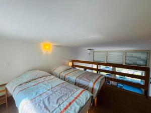 Appartements Appartement Libeccio 2 LUMIO : photos des chambres