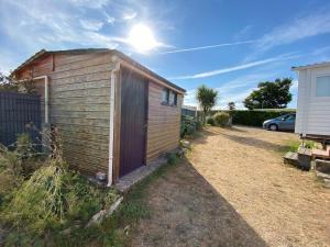 Villas Charmant Mobile-home 6 personnes sur terrain prive a 200 m de la plage - PADRIG : photos des chambres