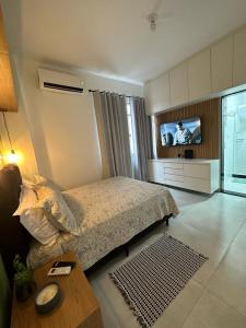 Acolhedor apartamento na quadra da praia