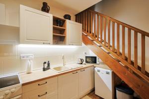 Chata Liptov, Domček v záhradách