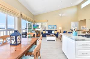 Multi Level Oceanfront Home with Patio on the Beach, Fire pit and 2 car garage