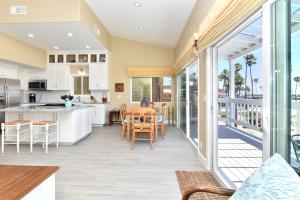 Multi Level Oceanfront Home with Patio on the Beach, Fire pit and 2 car garage