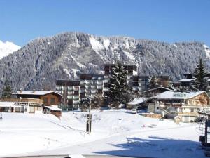 Résidence Les Alpages - Studio au pied des pistes dans une résidence avec piscine extérieure MAE-9784