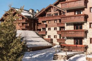 Appartements Residence Les Fermes de Meribel - maeva Home - Appartement pieces Prestige 74 : photos des chambres