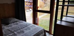 Résidence Aiguille Grive Bat Iii - Appartement 2 pièces 6 personnes en duplex, skis aux pieds, dans le village de Charmettoger à Arc 1800 MAE-1708