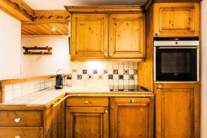 Appartements Residence Les Fermes de Meribel - maeva Home - Appartement 3 pieces 5 pers 87 : photos des chambres