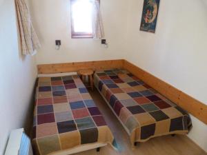 Résidence Armoise - Appartement 2 pièces 6 personnes à Arc 1800 en centre station, proche des pistes et des commerces, dans le village des Villard MAE-1879