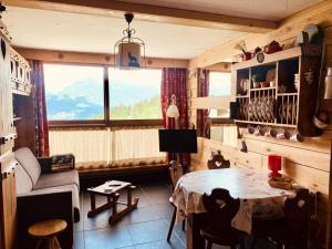 Résidence Les Charmettes - Chaleureux studio pour 3 personnes à Arc 1600, avec vue sur le Mont Blanc et proche des pistes et des commerces MAE-2151